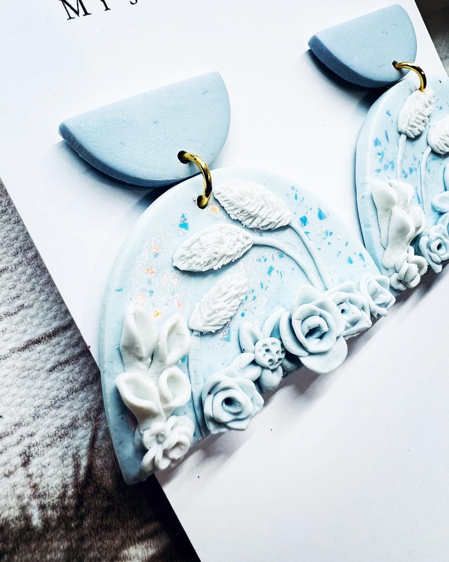 Blue floral clay earrings