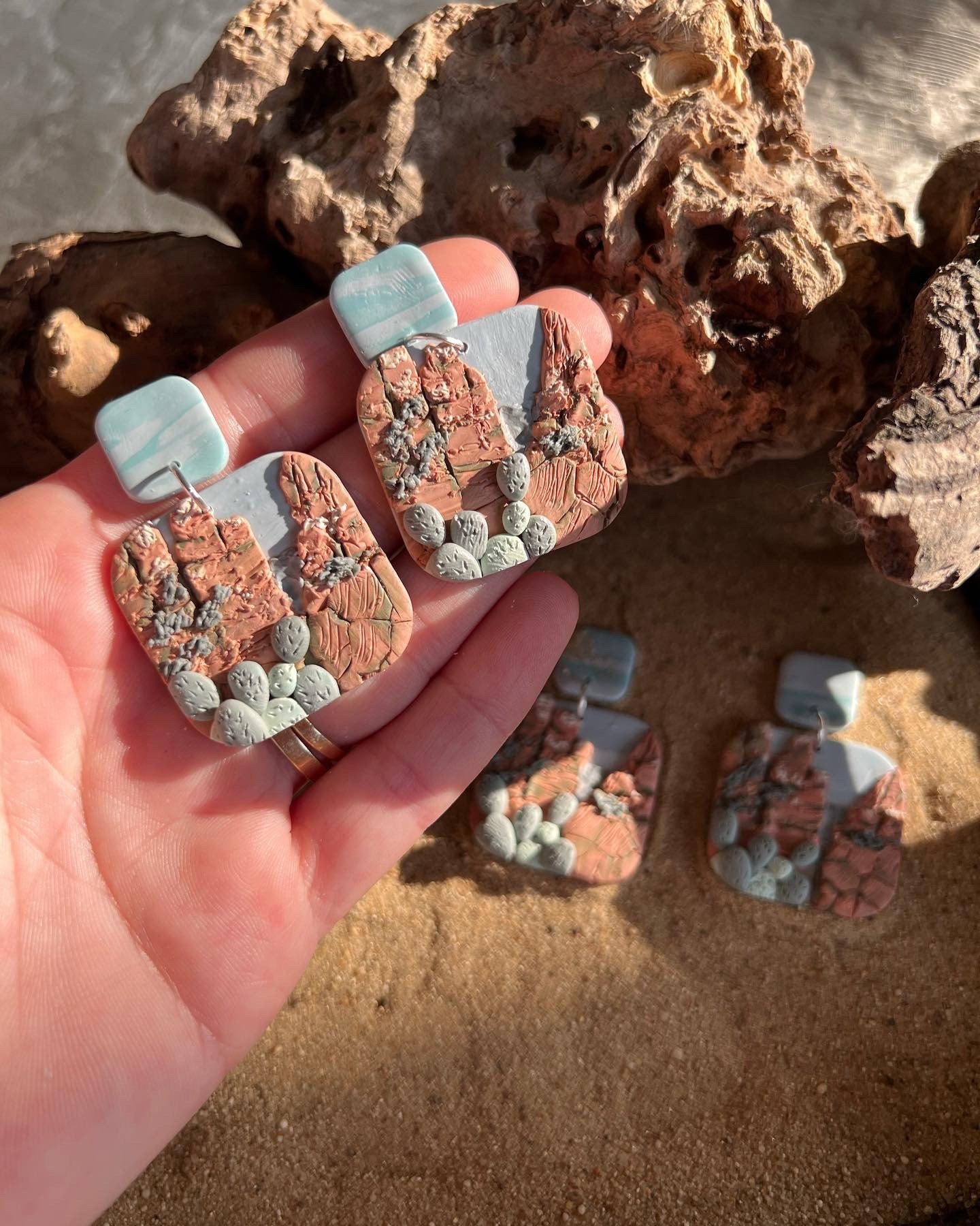 Arizona desert landscape clay earrings.