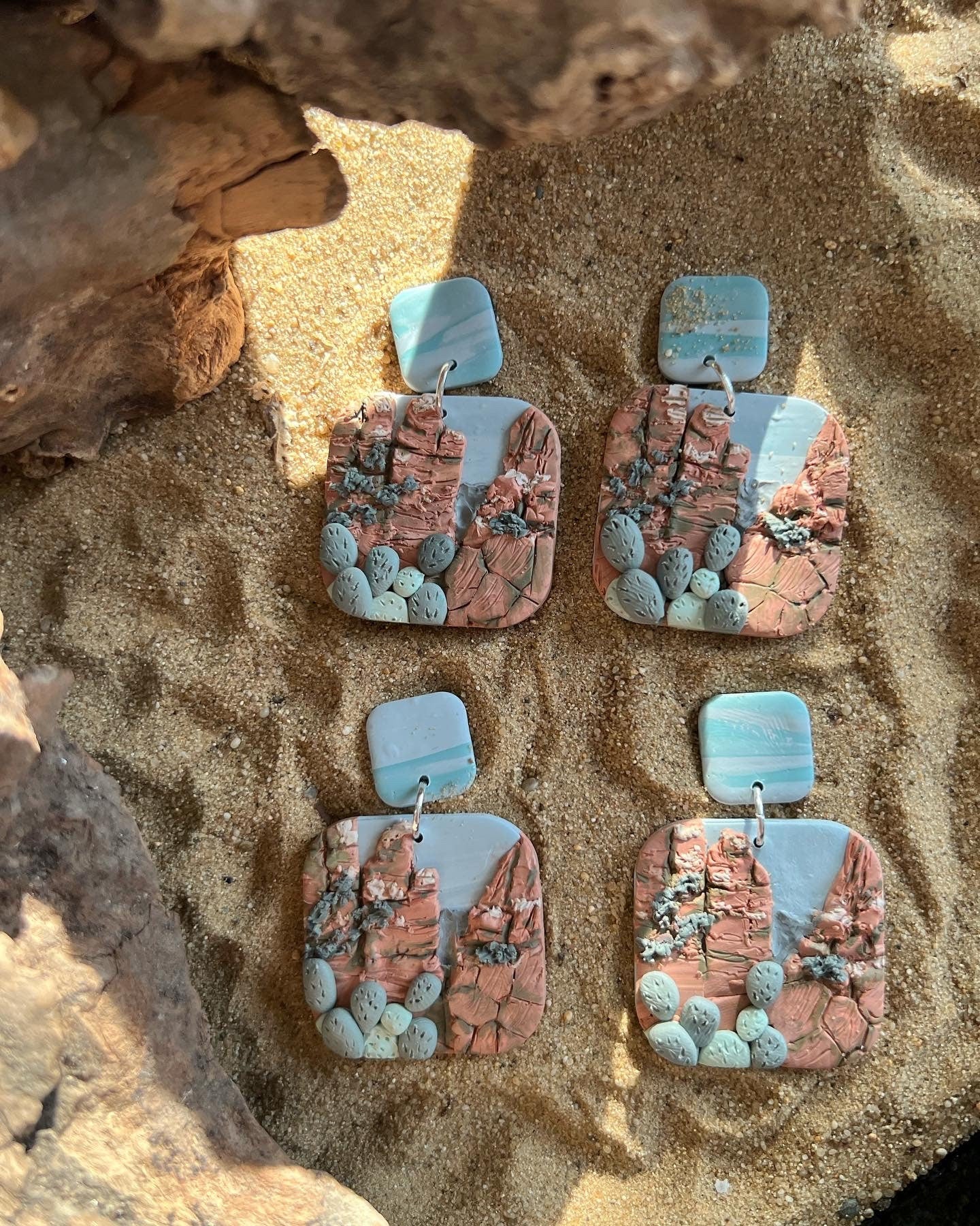 Arizona desert landscape clay earrings.