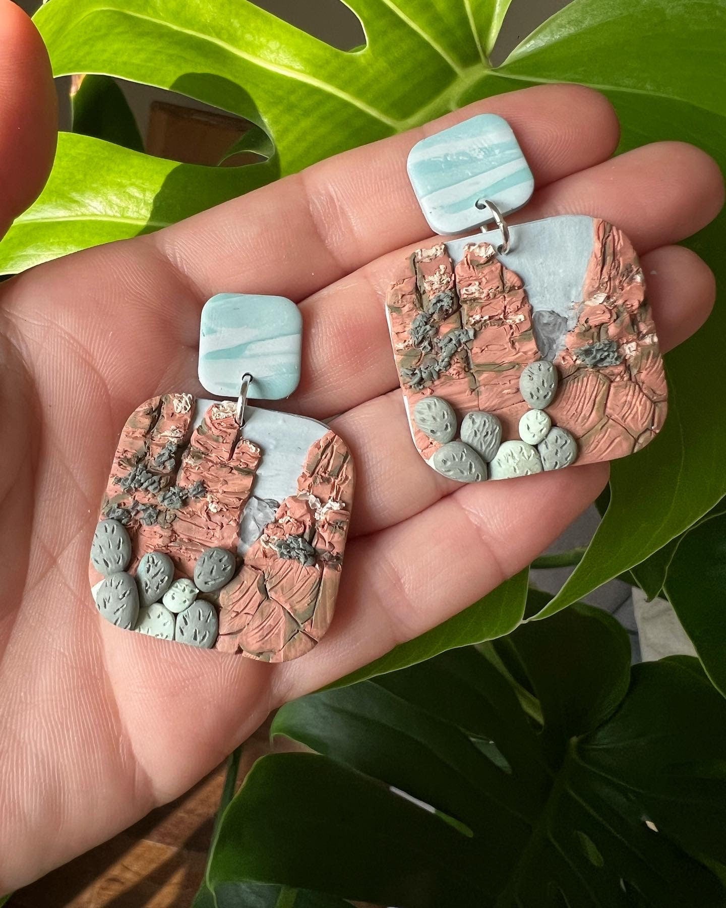 Arizona desert landscape clay earrings.